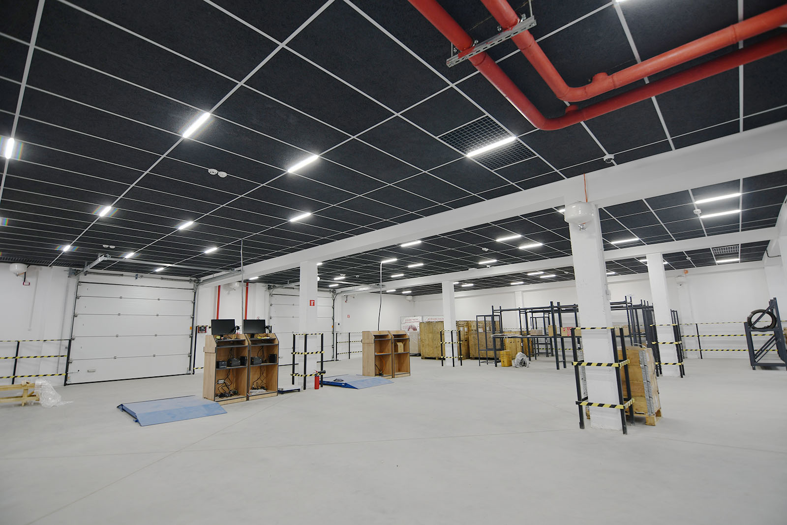 In the photo: Kraft WoodAcoustic acoustic panels in suspended ceilings in Nova Poshta branches. Kraft Led lighting system