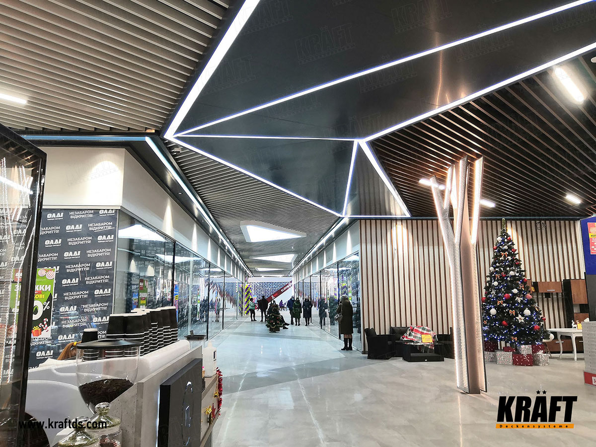 Cube-shaped suspended ceiling made of Kraft rail in shops and shopping centers 15